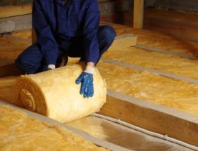 Construction,Worker,Thermally,Insulating,House,Attic,With,Glass,Wool