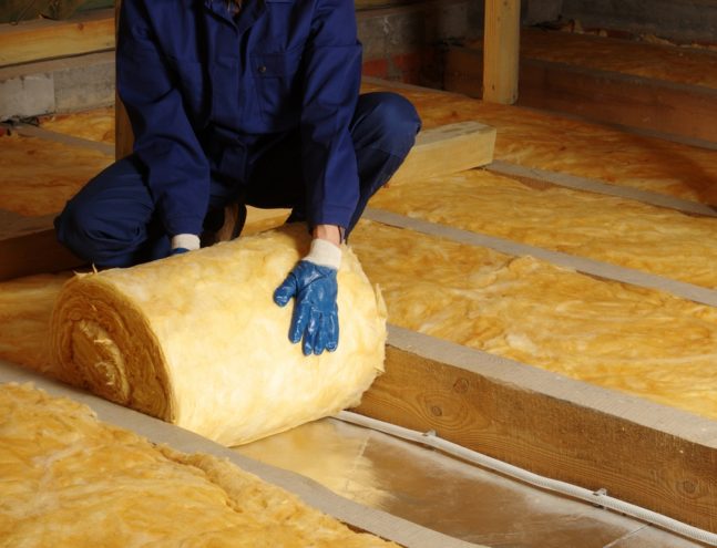Construction,Worker,Thermally,Insulating,House,Attic,With,Glass,Wool
